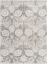 Close-up of the Cwm Area Rug, a clearance item with a contemporary floral medallion design in charcoal, gray, and off-white. Design-Rectangle-537