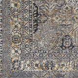 Close-up of the beige, black, and gray Dagatan Washable Area Rug featuring a traditional oriental pattern. Swatch