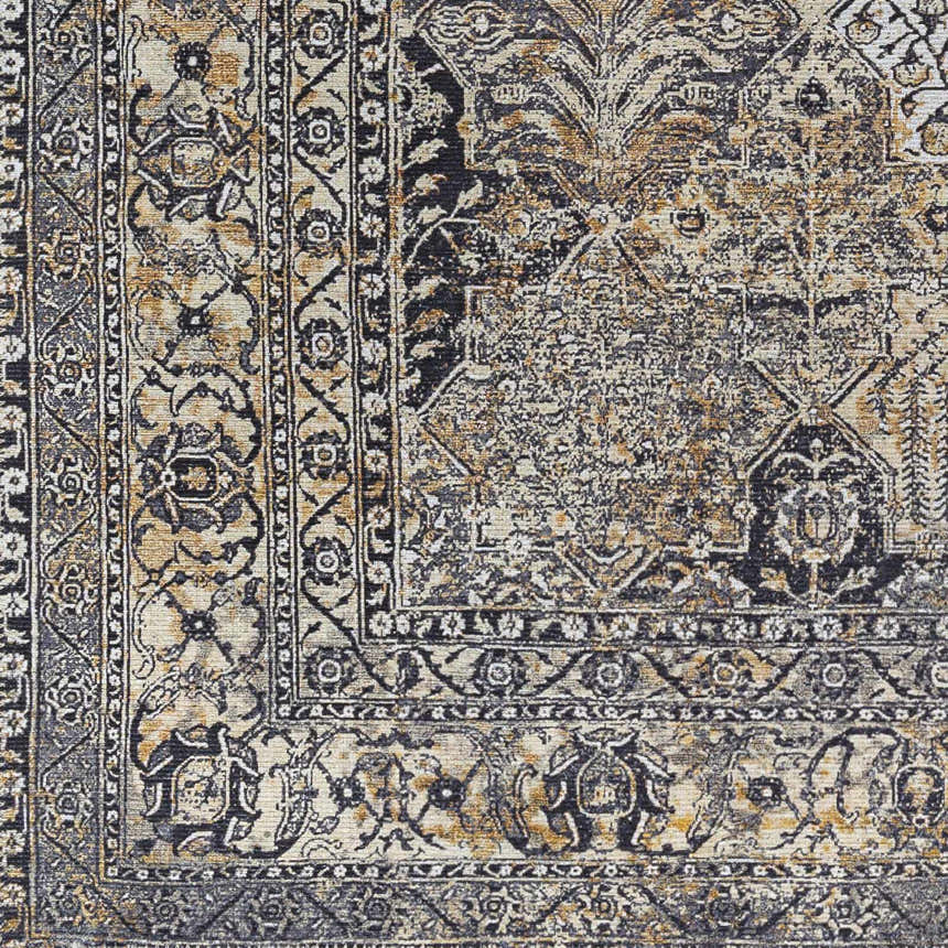 Close-up of the beige, black, and gray Dagatan Washable Area Rug featuring a traditional oriental pattern. Swatch