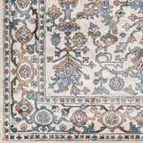 Close-up of the Dagny Area Rug. Farmhouse style with cloud gray, light gray, blue, and nutmeg floral pattern. Swatch