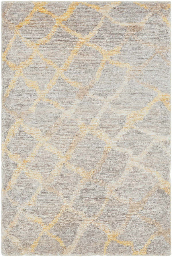 Close-up of the Daisytown Area Rug. Beige rug with a contemporary animal pattern in brown, gray, and off-white viscose. Design-Rectangle-23