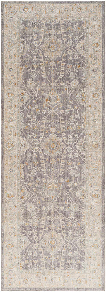 Close-up of the Dalupirip rug, a thick, luxe statement piece with a traditional oriental pattern in brown, beige, and gray tones. Design-Runner-2773