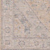 Close-up of the Deena Thick Luxe Area Rug. Features a traditional pattern in brown, charcoal, and dusty sage hues. Swatch