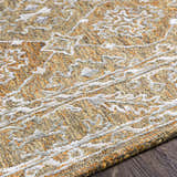 Close up of Dimboola Wool & Faux Silk Rug showing texture, pattern, and colors of beige, orange and gray. Hand tufted rug. Texture
