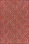 Close-up of the Dittmer Area Carpet. Brick red wool rug with a beige quatrefoil pattern, hand woven texture. Design-Rectangle-576