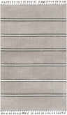 Close-up of the Dita Area Rug: dark gray, multi brown, and natural gray geometric pattern with tassels. Design-Rectangle-57
