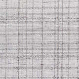 Close-up of Delanco Area Rug showing a hand-loomed, contemporary design in ivory, pale blue, and dark brown viscose. Swatch