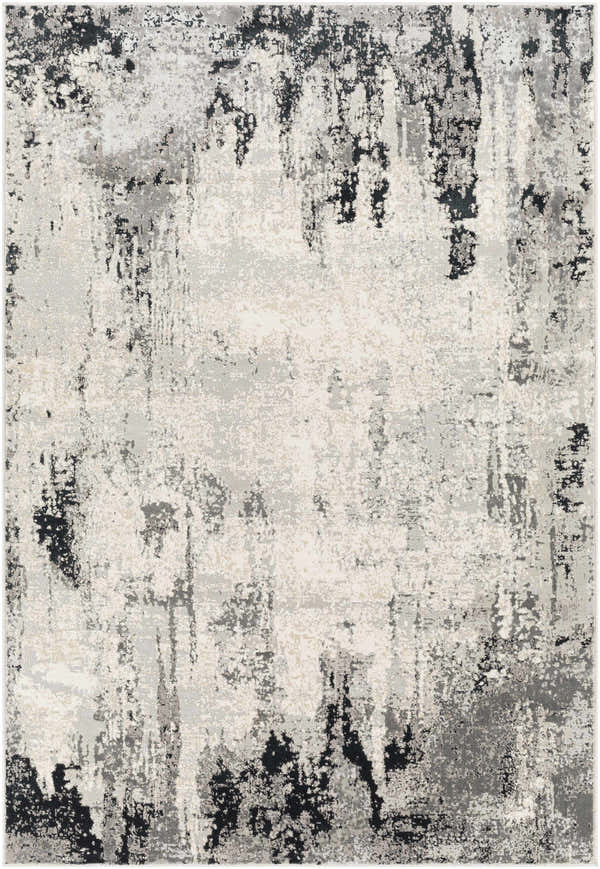 Close-up of the Dumangas Area Rug, a contemporary rug in black, charcoal, cream, and gray with an abstract pattern. Design-Rectangle-5373