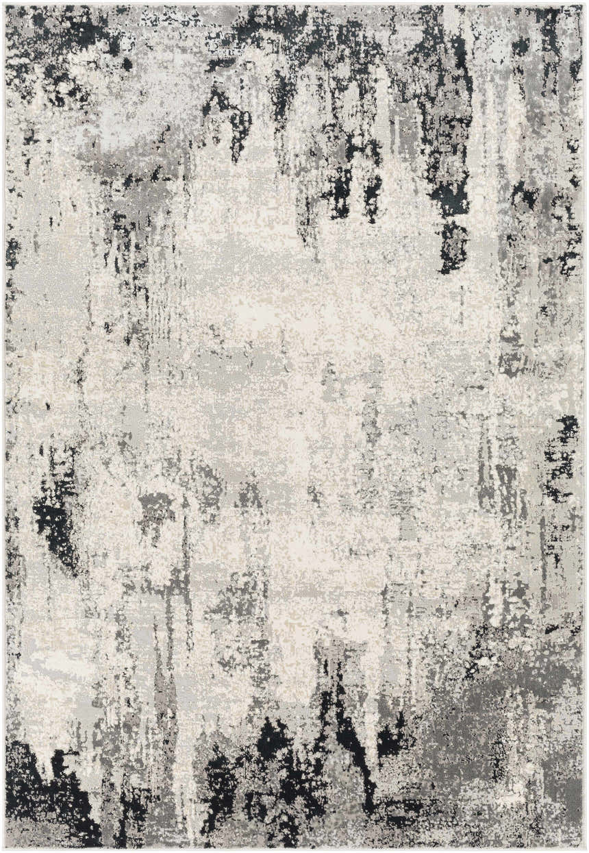 Close-up of the Dumangas Area Rug, a contemporary rug in black, charcoal, cream, and gray with an abstract pattern. Design-Rectangle-5373