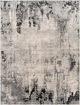 Close-up of the Dumangas Area Rug featuring a contemporary black, charcoal, cream, and gray abstract design. Design-Rectangle-71010