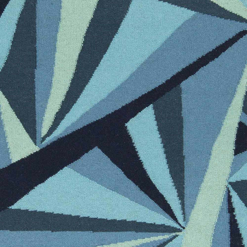 Close-up of the hand woven Dennis Area Rug. Features a contemporary geometric pattern in aqua, blue, navy, and sage wool. Swatch