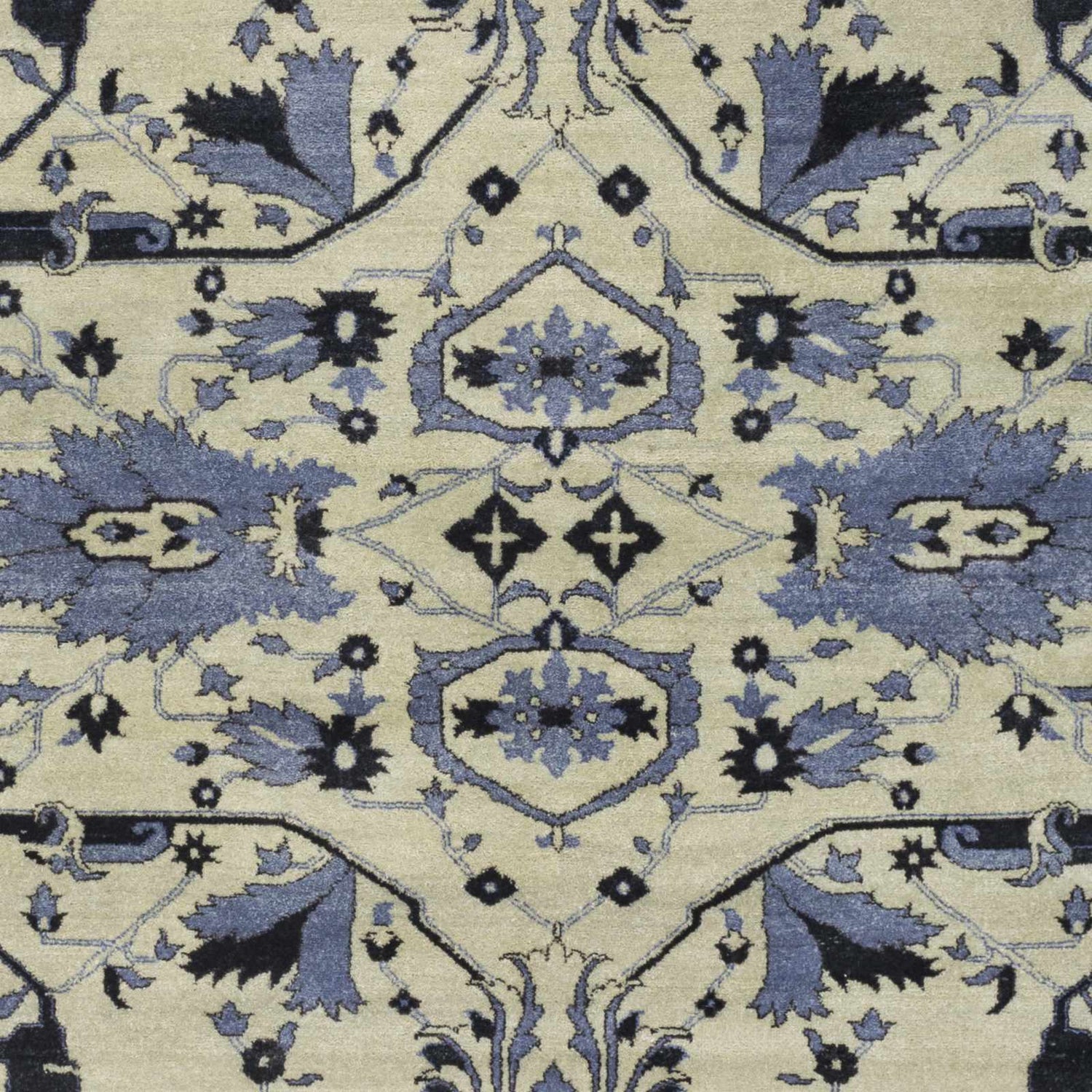 Close-up of Doraville Area Carpet featuring a traditional floral pattern in black, blue, and seafoam on a light background. Swatch
