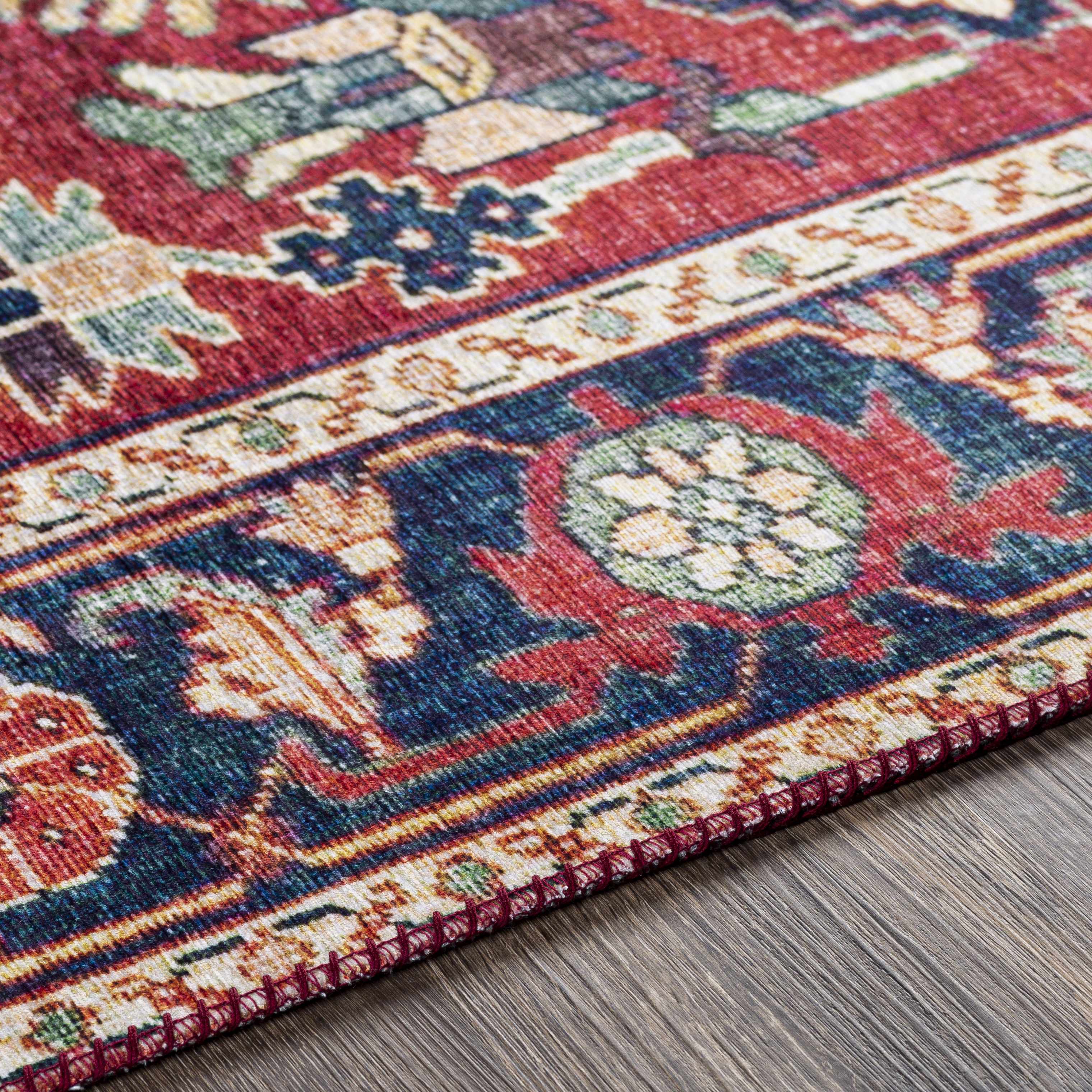 Close-up of the texture on Dorcas Red Performance Rug, showing fabric weave and feel. Traditional Area Rug Backing Canvas 