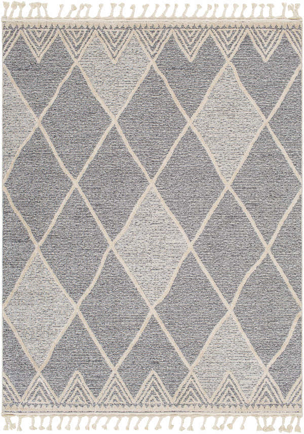 Close-up of the Dumlan Area Carpet, a gray and light gray rug with a diamond pattern and tassels. Design-Rectangle-537
