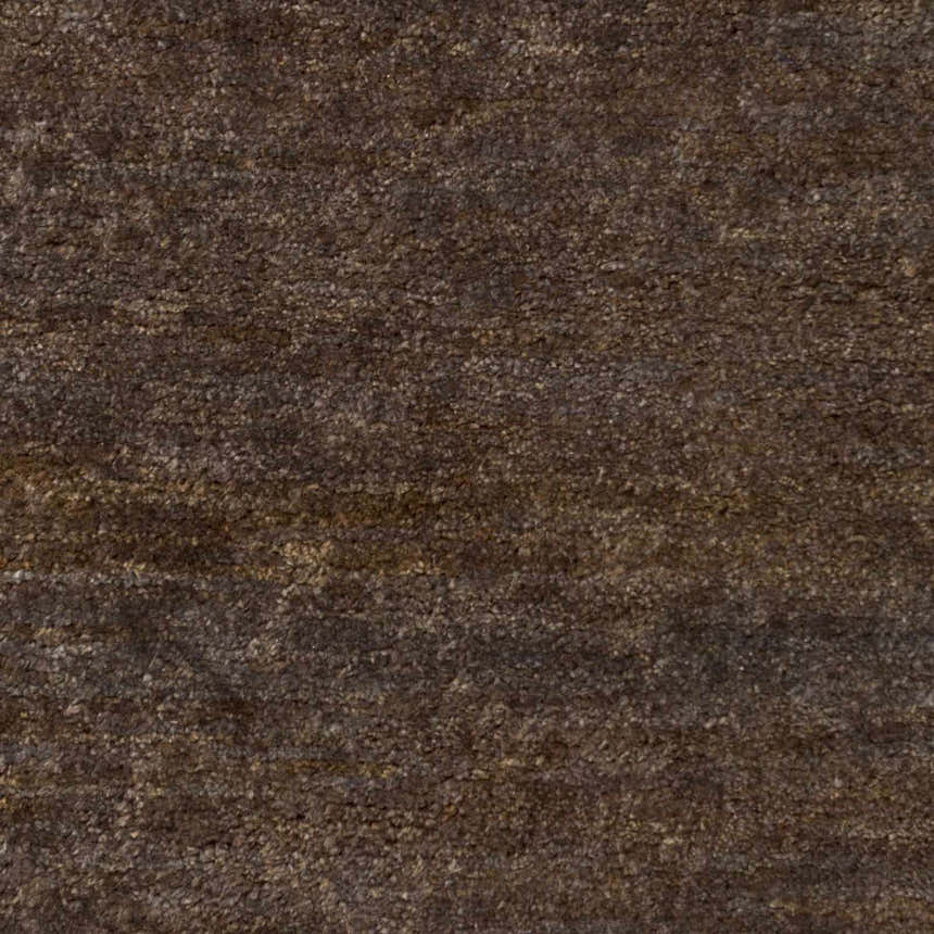 Close-up of the textured, hand-woven Dummerston Jute Carpet in black. Farmhouse style rug. Swatch