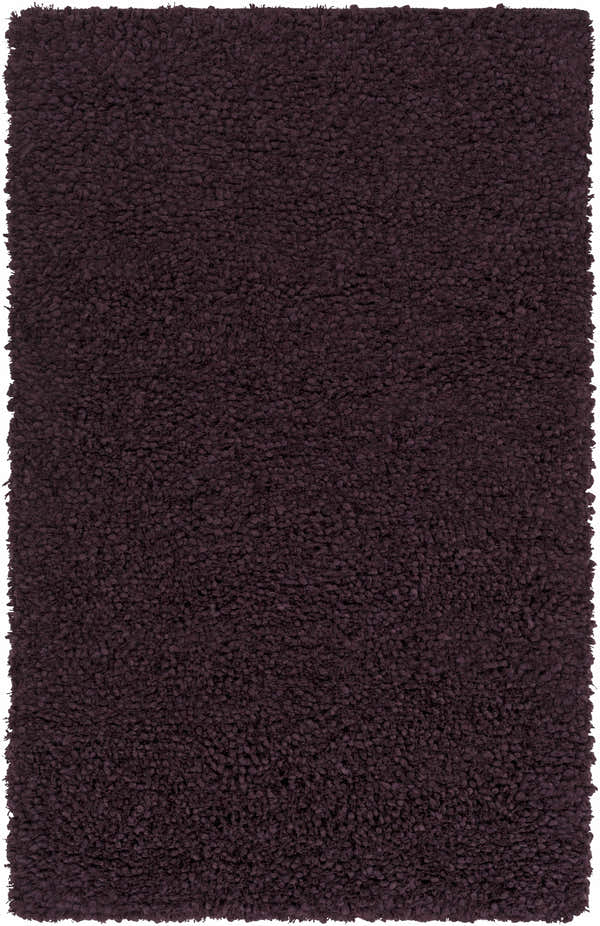 Close-up of the plush, hand-woven Duncanville Area Carpet in plum. Features a thick, textured pile made of 100% wool. Design-Rectangle-58