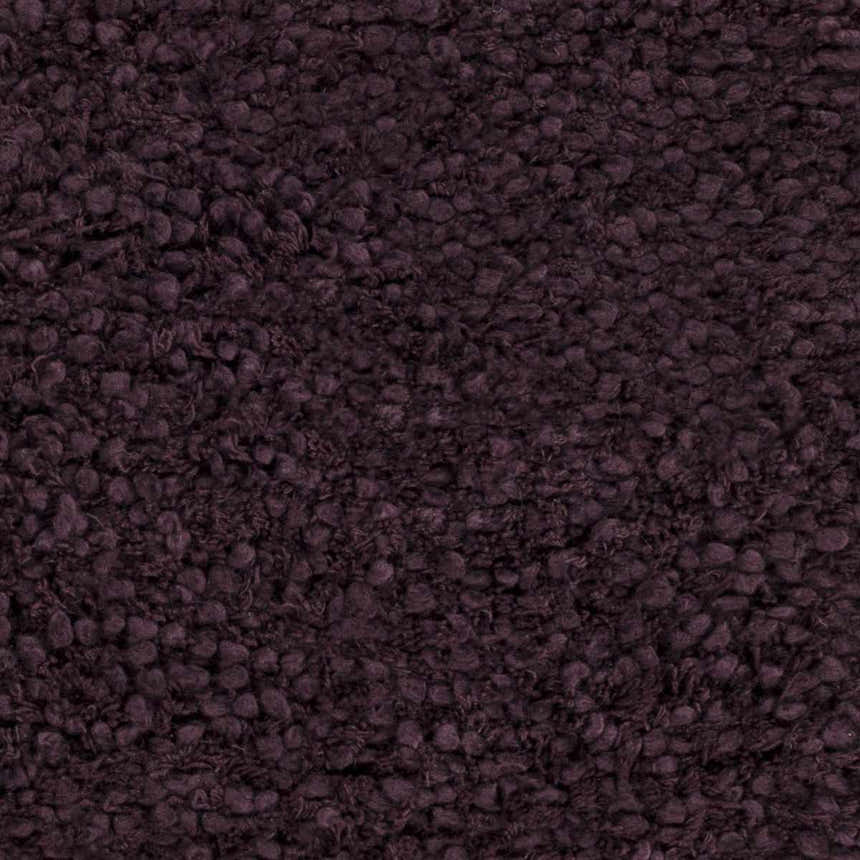 Close-up of the Duncanville Area Carpet in plum, showing the hand-woven texture of the 100% wool material. Swatch