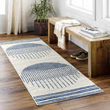 Entryway styled with a Duri Area Rug. The runner rug has a geometric blue pattern on a natural background. Roomscene-Runner