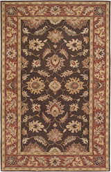 Close-up of the Daviston Area Rug. Hand-tufted wool rug in dark brown with beige, brick red, and burnt orange floral pattern. Design-Rectangle-58