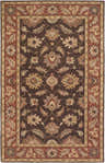 Close-up of the Daviston Area Rug. Hand-tufted wool rug in dark brown with beige, brick red, and burnt orange floral pattern. Design-Rectangle-58