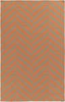 Close-up of the Dyer Area Rug, a hand-woven wool rug with an orange and light brown chevron pattern. Design-Rectangle-58