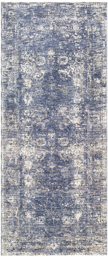 Close-up of the Eastham Luxe Area Rug. Denim and light beige create a vintage, distressed Oriental pattern. Design-Runner-3310