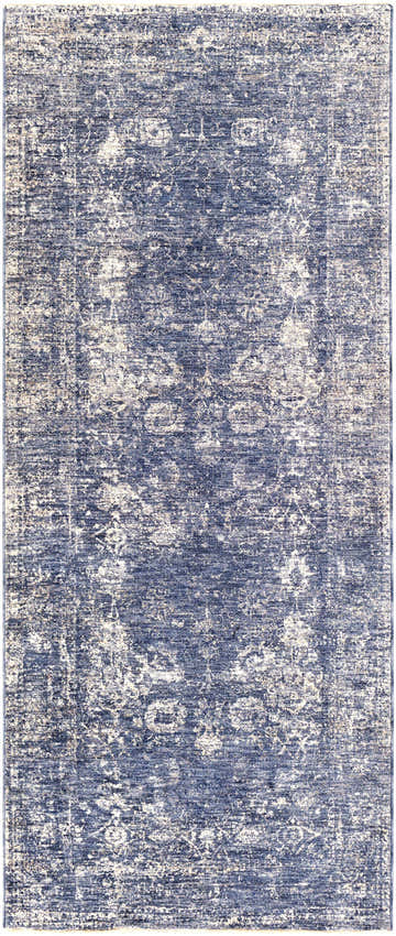 Close-up of the Eastham Luxe Area Rug. Machine-woven polyester rug in denim, light beige, and navy with a traditional, vintage pattern. Design-Runner-338