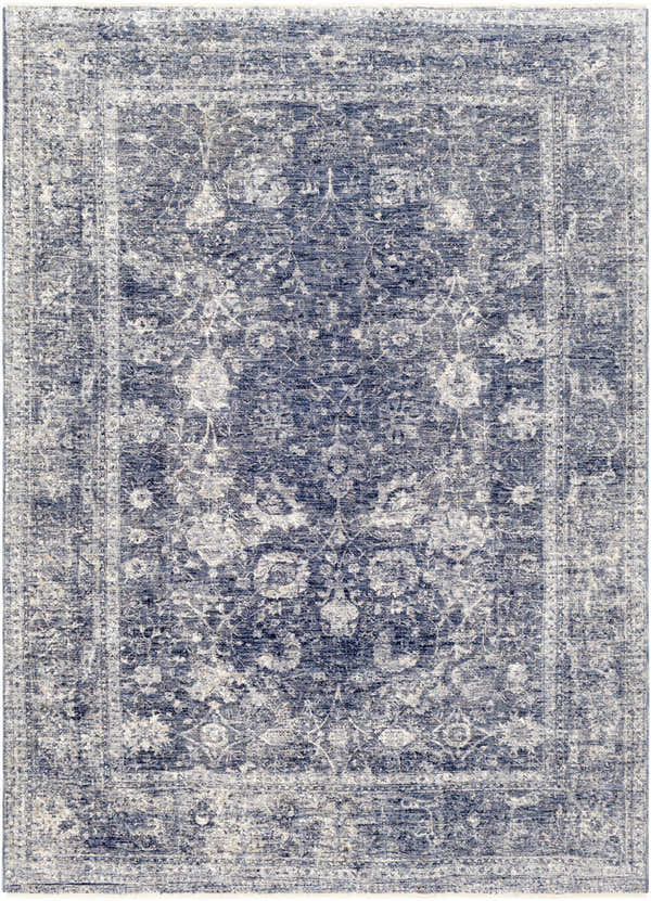 Close-up of the Eastham Luxe Area Rug. Machine-woven polyester rug in denim, light beige, and navy with a traditional oriental pattern. Design-Rectangle-582