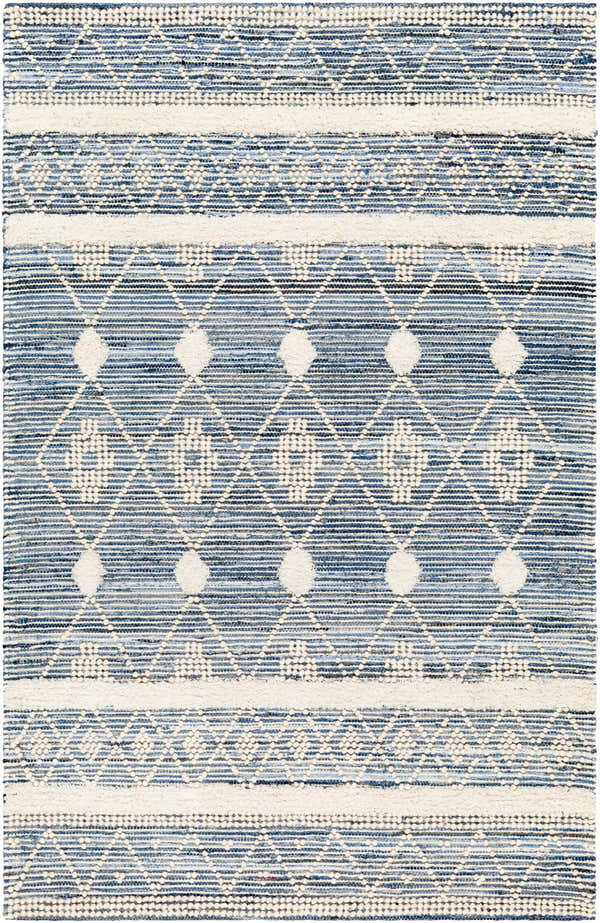 Close-up of Eben Area Carpet: hand-woven cotton rug with a geometric diamond pattern in shades of light blue, navy, and off-white. Design-Rectangle-576