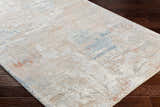 Close-up of the Efren Thick Luxe Area Rug showing its dark beige, dusty sage, and gray contemporary design. Corner