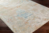Close-up of the Efren Thick Luxe Area Rug showing its dark beige, dusty sage, and gray contemporary design. Corner
