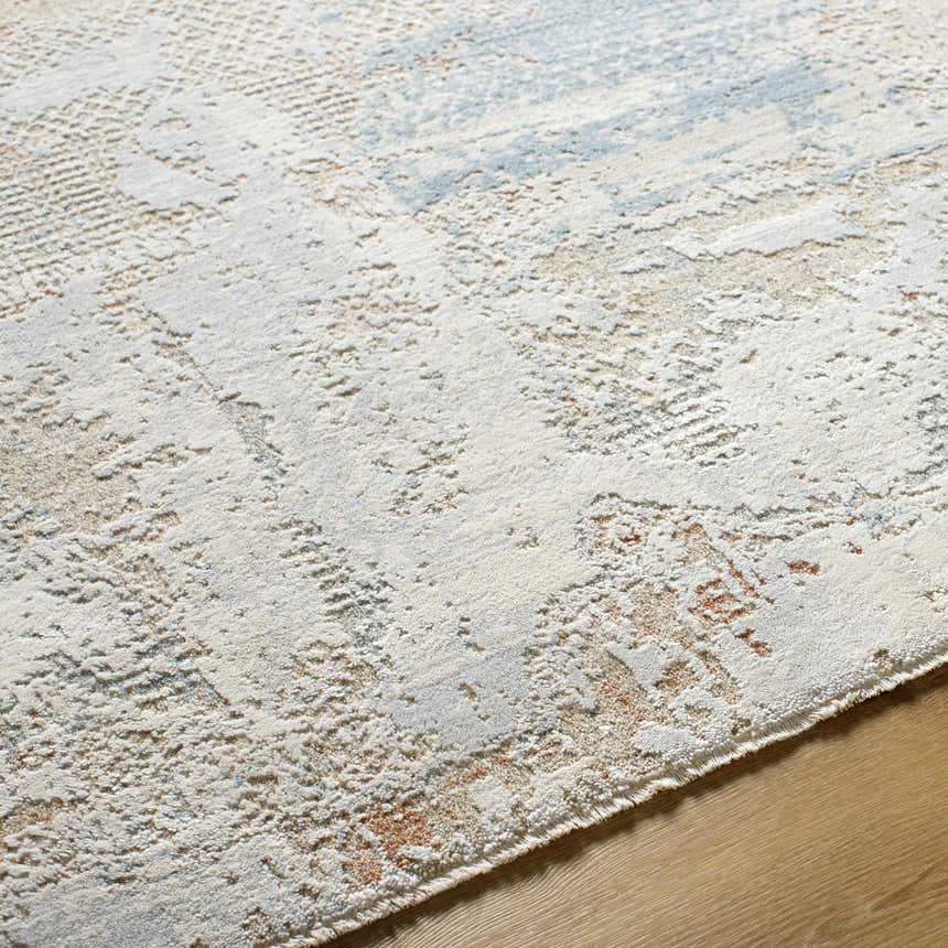 Close-up of the Efren Thick Luxe Area Rug showing its beige, gray, and sage contemporary design and plush texture. Texture