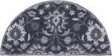 Close-up of the Conesus Hand Tufted Blue Area Rug. Hearth shape with charcoal, denim, and slate blue floral pattern. Design-Hearth