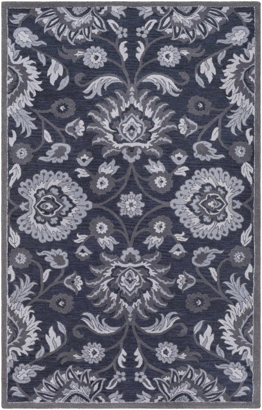 Detailed view of the Conesus Hand Tufted Blue Area Rug. Features a traditional floral pattern in shades of blue, charcoal, and gray. Design-Rectangle-58