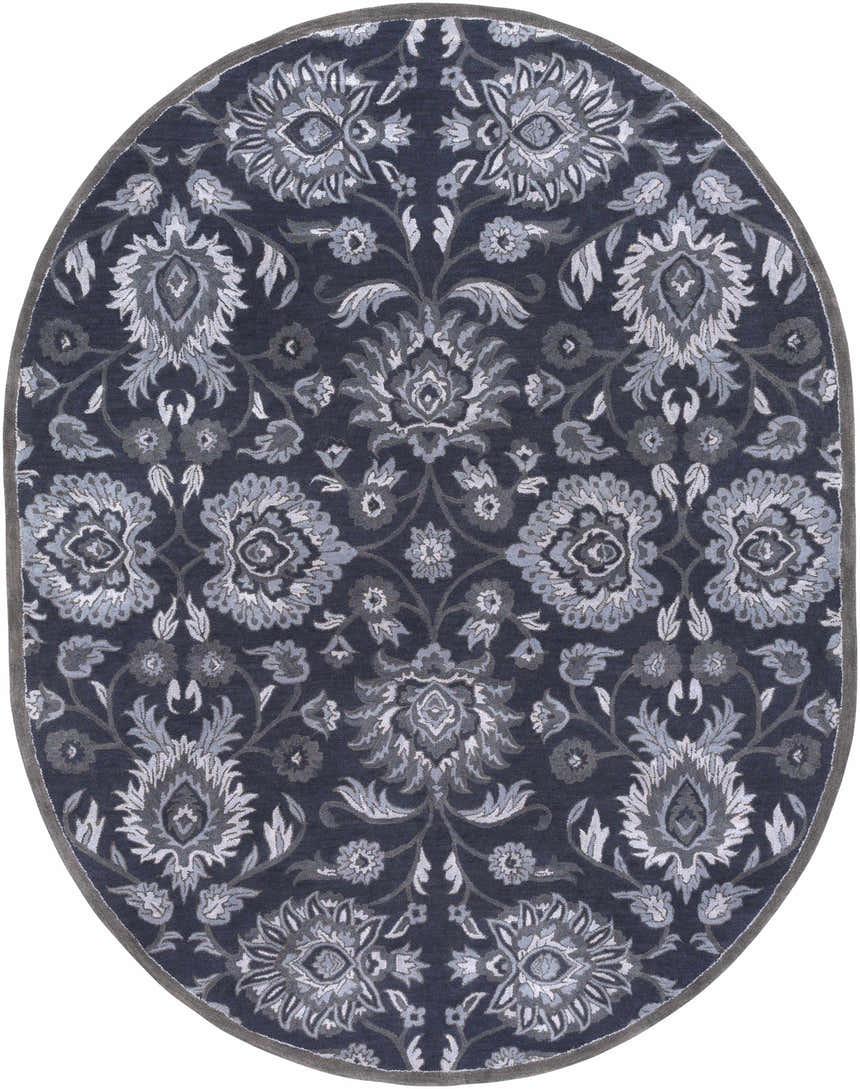 Oval Conesus Hand Tufted Blue rug with a traditional floral pattern in shades of charcoal, denim, and slate blue. Design-Oval-810