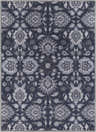 Close-up of the Conesus Hand Tufted Blue Area Rug, featuring a traditional floral pattern in denim, slate, and charcoal hues. Design-Rectangle-811