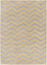Close-up of the Eloy Area Rug. Charcoal and mustard chevron pattern, machine woven polypropylene rug. Design-Rectangle