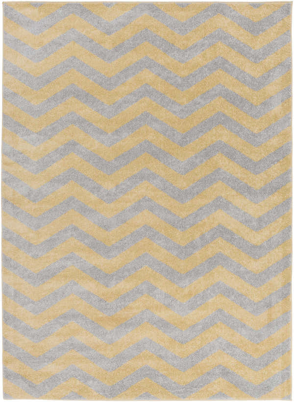 Close-up of the Eloy Area Rug. Charcoal and mustard chevron pattern, machine woven polypropylene rug. Design-Rectangle