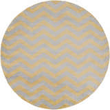 Round Eloy Area Rug in charcoal and mustard, featuring a contemporary chevron pattern. Design-Round