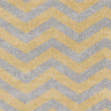 Close-up of the Eloy Area Rug showing a charcoal and mustard chevron pattern and soft, textured weave. Swatch