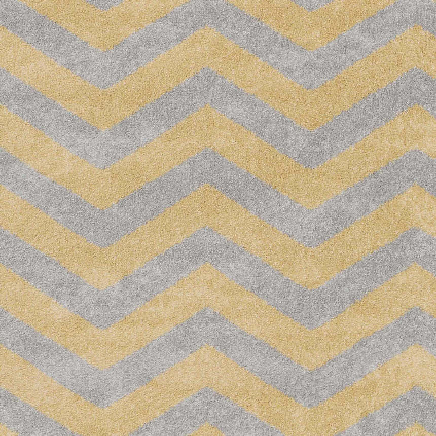 Close-up of the Eloy Area Rug showing a charcoal and mustard chevron pattern and soft, textured weave. Swatch