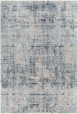 Close-up of the Eltham Thick Luxe Rug, featuring a contemporary abstract pattern in dusty sage, light gray, and navy. Design-Rectangle-575