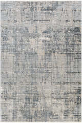 Close-up of the Eltham Thick Luxe Rug in light gray, navy, and taupe. Contemporary style with a subtle abstract pattern. Design-Rectangle-6796