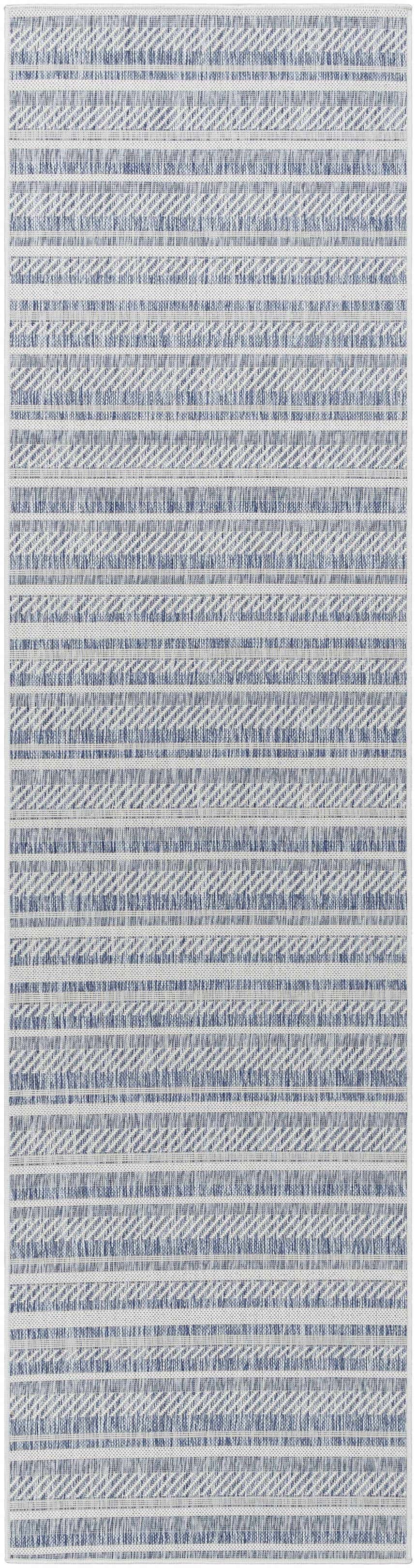 Close-up of the Emirgazi Striped Nordic Rug. Blue and off-white stripes with a subtle textured pattern. Bohemian style. Design-Runner-2710