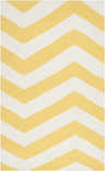 Close-up of Enniskillen Area Rug. Hand-woven 100% wool rug with a bold white and yellow chevron pattern. Design-Rectangle-58