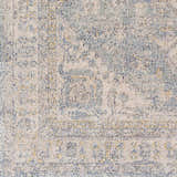 Close-up of Tusa Blue Area Rug showing a traditional, oriental pattern in dark blue, ivory, and light blue hues. Swatch
