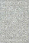 Close-up of the Eriline Wool & Faux Silk Rug. Features denim, ivory, sage, and taupe floral pattern. Hand-tufted texture. Design-Rectangle-576