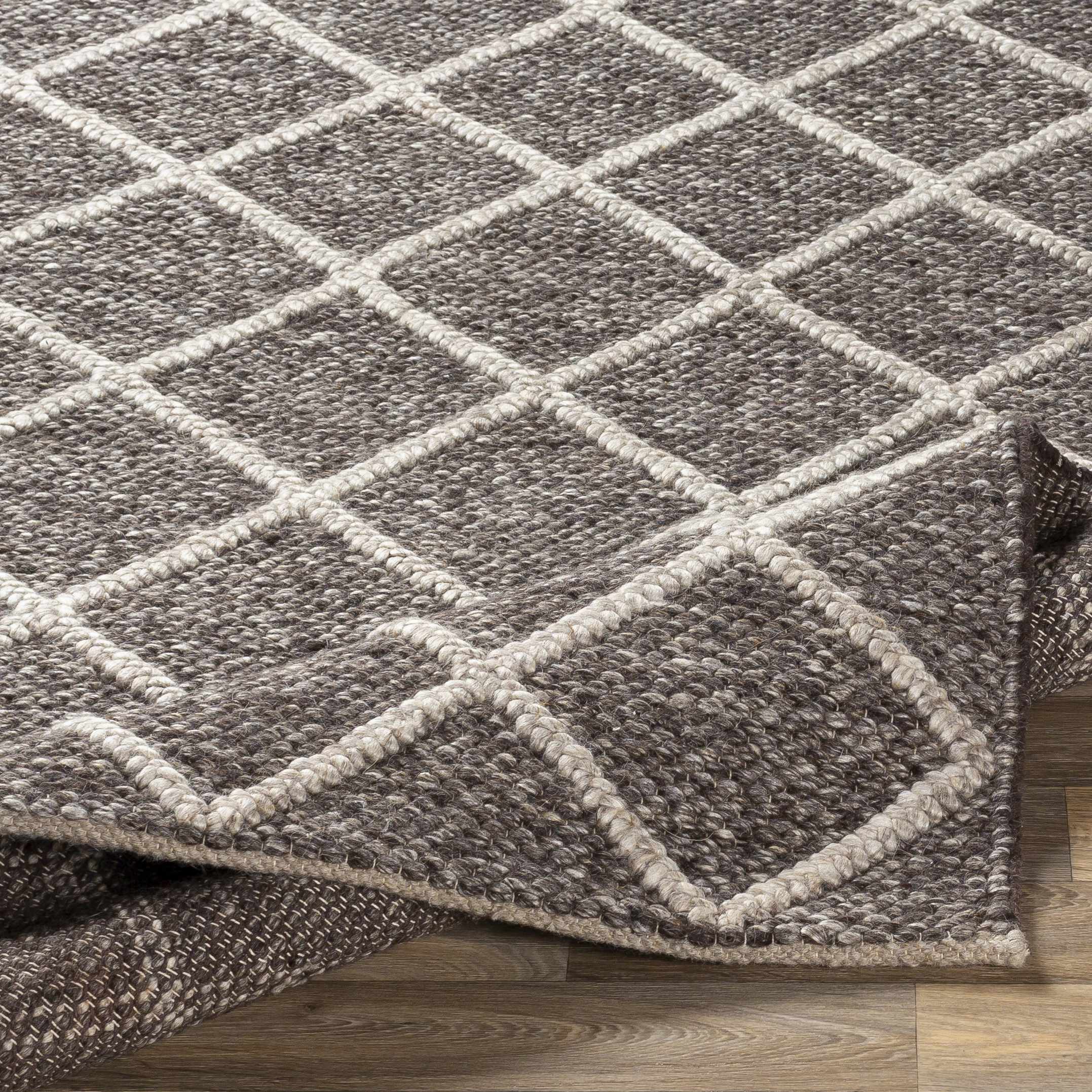 Folded section of Syosset 2x3 Brown Trellis Wool&Viscose Rug - Clearance, displaying material thickness and weave. Contemporary Area Rug Backing  