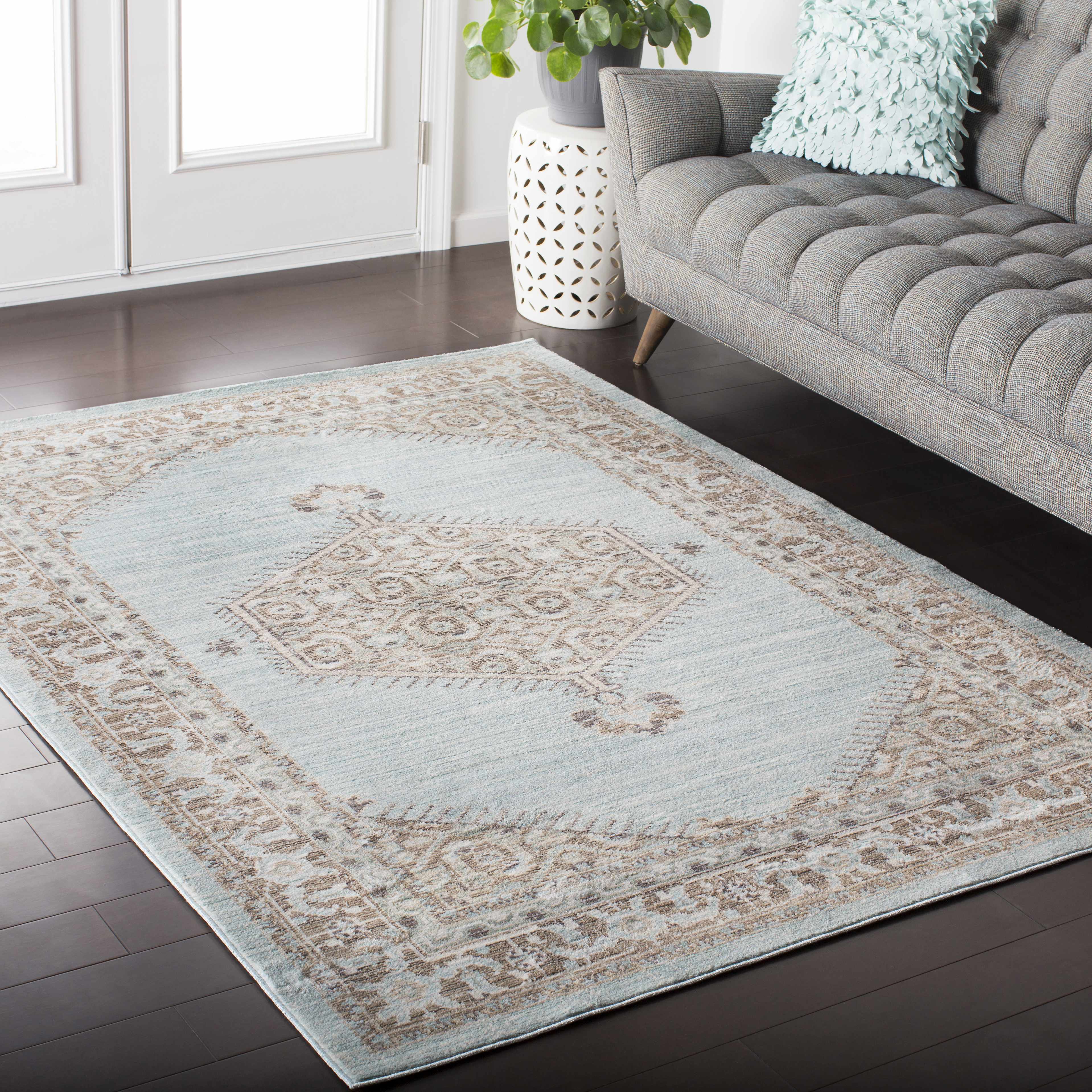 Escoheag Area Rug - Clearance placed in a styled room setting, harmonizing with surrounding room decor. Traditional Area Rug Backing  