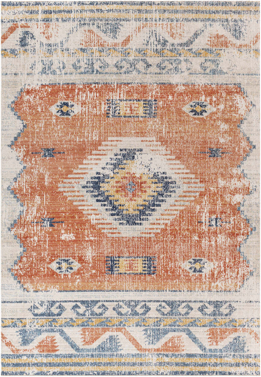 Close-up of the Etobicoke Area Rug featuring a Southwestern-inspired design in brick red, cream, denim, and gray. Distressed texture. Design-Rectangle-537